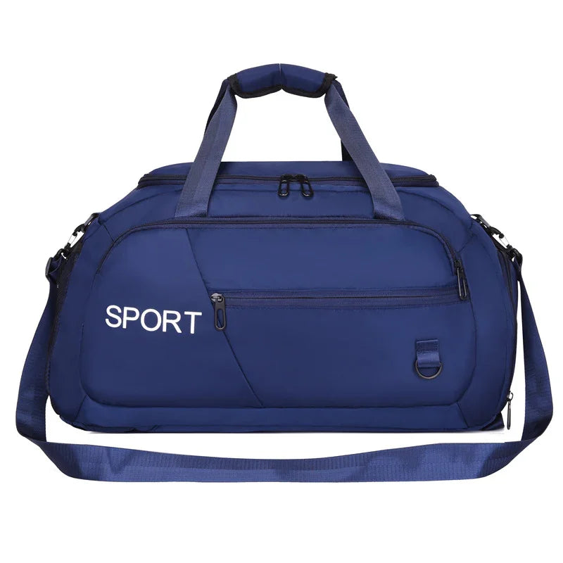 Navy blue sport duffel bag with adjustable shoulder strap, multiple zippers, and 'SPORT' text for gym or travel use