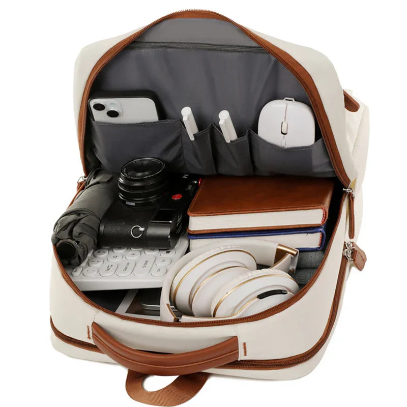 Stylish travel backpack with organized compartments for tech, books, and accessories