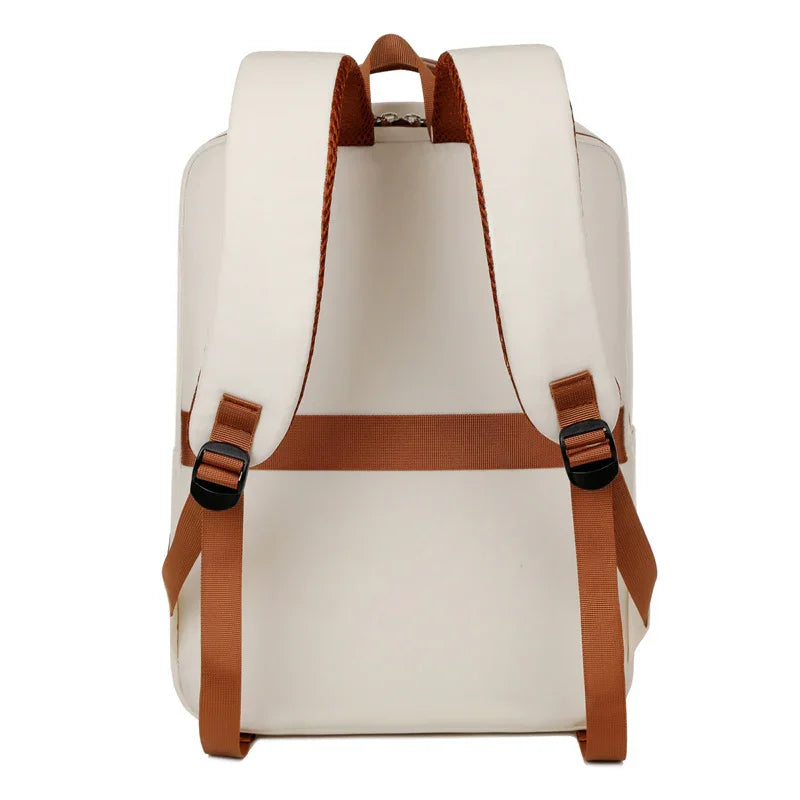 Cream backpack with brown straps and buckles, stylish and durable design for travel or daily use