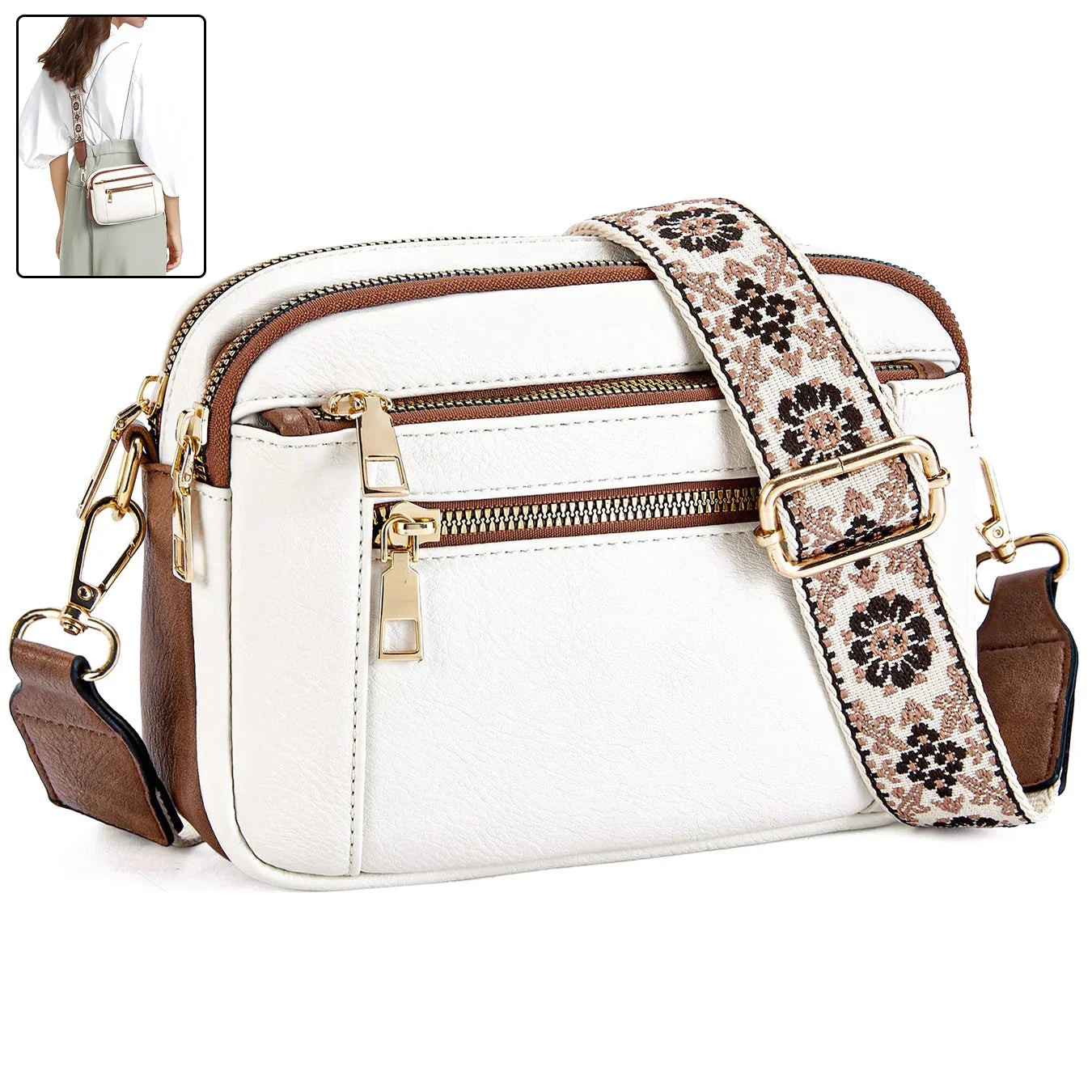 White crossbody bag with floral strap, gold zippers, and brown accents for women's fashion