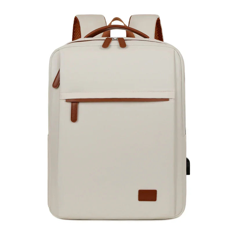 Cream laptop backpack with brown leather accents, front pocket, and USB port for travel and daily use