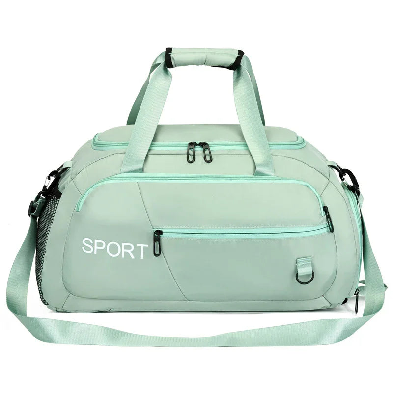 Mint green sport duffel bag with multiple zippers and shoulder strap for gym or travel